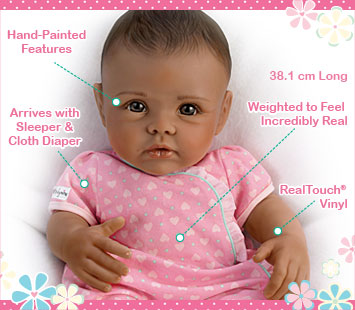 This lifelike So Truly Mine doll from The Ashton-Drake Galleries is crafted with RealTouch vinyl, has hand-painted features, arrives with a sleeper and cloth diaper, is weighted to feel incredibly real and is 38.1 centimetres long.